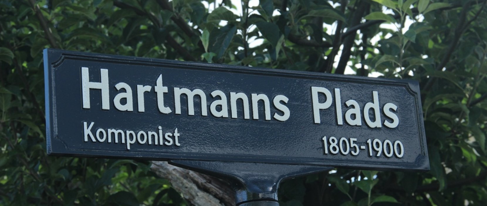 skilt med Hartmanns Plads