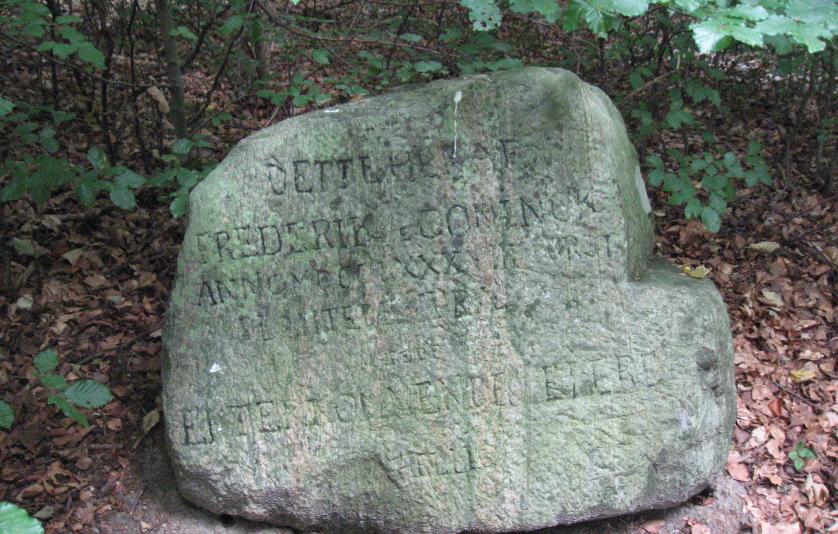 Det første træ monument